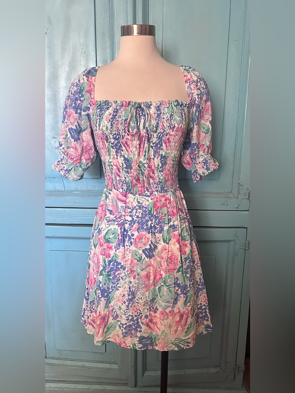 Faithfull the Brand Floral Smocked Mini Dress in Pink, Lavender, and Green